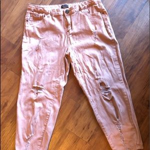 Pink women’s distressed capris